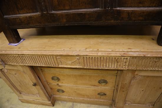 A 19th century pine inverse breakfront sideboard, W.150cm, D.58cm, H.79cm